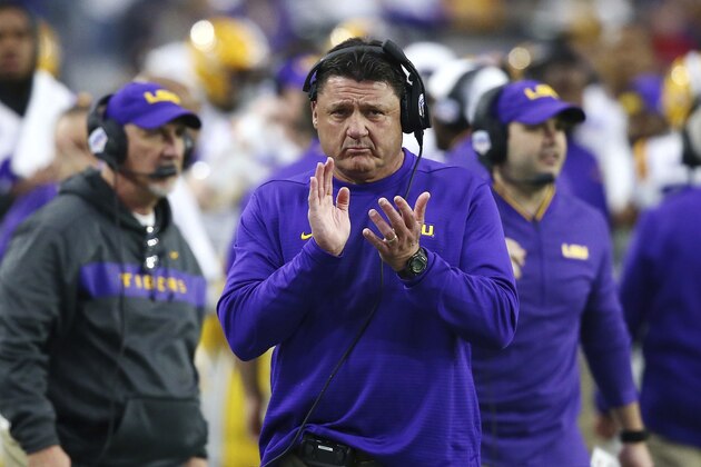 LSU head coach Ed Orgeron applauds his players during the first half against UCF in the Fiesta Bowl NCAA college football game Tuesday, Jan. 1, 2019, in Glendale, Ariz. (AP Photo/Ross D. Franklin) LSU head coach Ed Orgeron applauds his players during the first half against UCF in the Fiesta Bowl NCAA college football game Tuesday, Jan. 1, 2019, in Glendale, Ariz. (AP Photo/Ross D. Franklin)