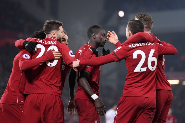 LIVERPOOL, ENGLAND - JANUARY 19:  Sadio Mane of Liverpool celebrates with teammates after scoring his sides fourth goal during the Premier League match between Liverpool FC and Crystal Palace at Anfield on January 19, 2019 in Liverpool, United Kingdom.  (Photo by Laurence Griffiths/Getty Images)