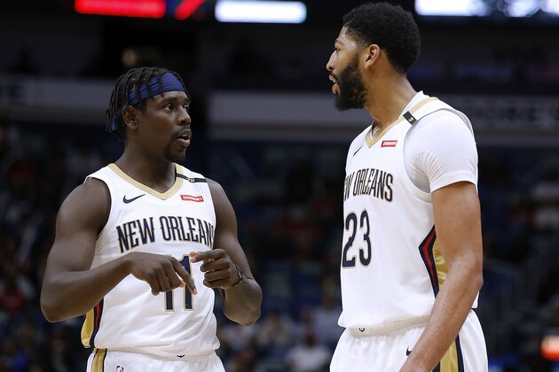 NEW ORLEANS, LA - DECEMBER 03:  Anthony Davis #23 of the New Orleans Pelicans and Jrue Holiday #11 talk during the first half against the LA Clippers at the Smoothie King Center on December 3, 2018 in New Orleans, Louisiana. NOTE TO USER: User expressly acknowledges and agrees that, by downloading and or using this photograph, User is consenting to the terms and conditions of the Getty Images License Agreement.  (Photo by Jonathan Bachman/Getty Images)