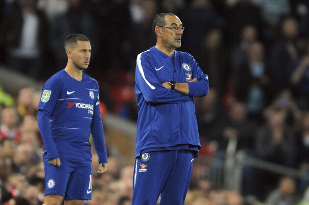 Chelsea manager Maurizio Sarri, center, looks out with Eden Hazard during the English League Cup soccer match between Liverpool and Chelsea at Anfield stadium in Liverpool, England, Wednesday, Sept. 26, 2018. (AP Photo/Rui Vieira)