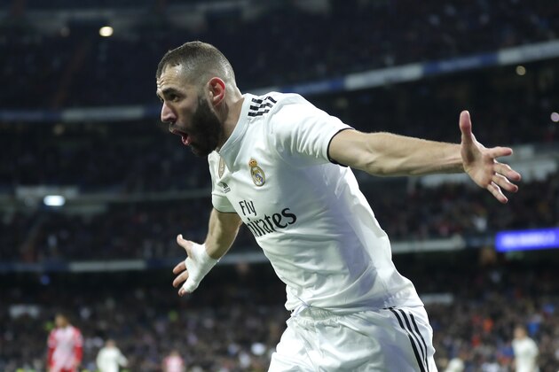 Real Madrid's Benzema celebrates after scoring during a Spanish Copa del Rey soccer match between Real Madrid and Girona in Madrid, Spain, Thursday, Jan. 24, 2019. (AP Photo/Manu Fernandez)