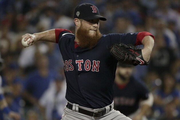 Boston Red Sox relief pitcher Craig Kimbrel throws against the Los Angeles Dodgers during the ninth inning in Game 3 of the World Series baseball game on Friday, Oct. 26, 2018, in Los Angeles. (AP Photo/Jae C. Hong)