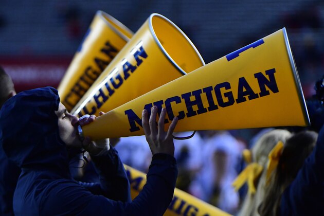 PISCATAWAY, NJ - NOVEMBER 10: Michigan Wolverines cheerleaders fire up the crowd against the Rutgers Scarlet Knights during the second quarter at HighPoint.com Stadium on November 10, 2018 in Piscataway, New Jersey. Michigan won 42-7. (Photo by Corey Perrine/Getty Images)