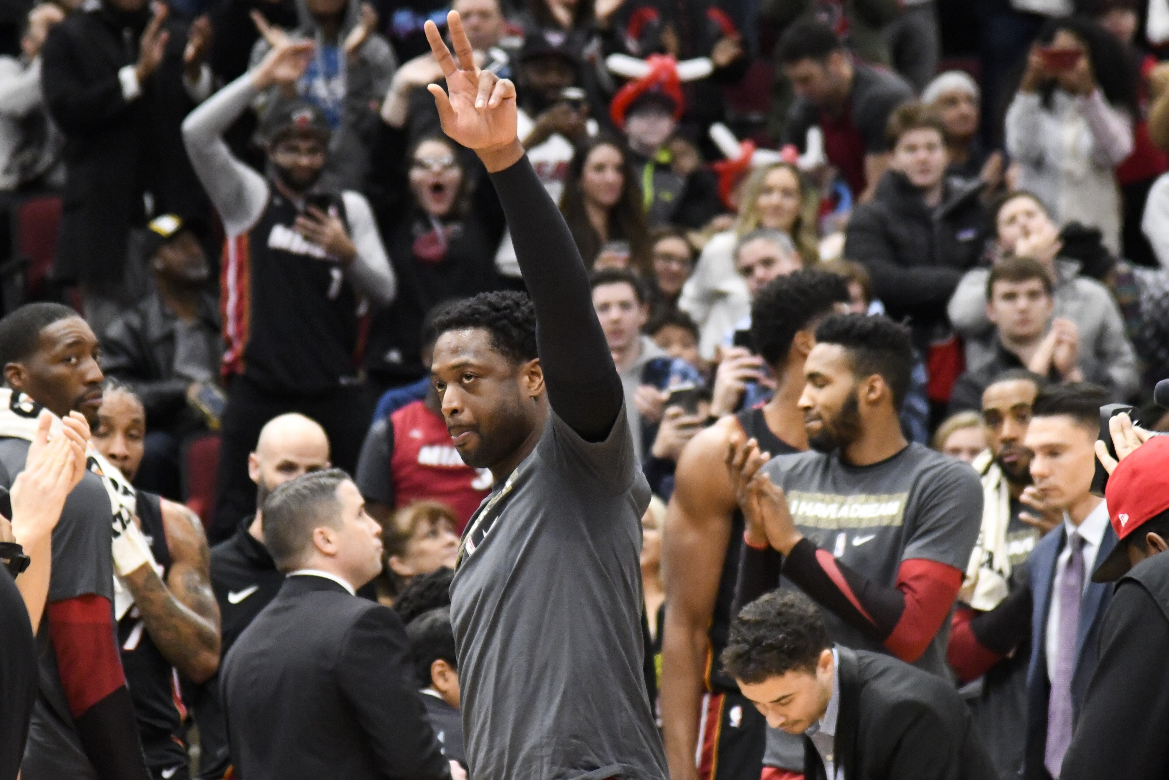 Miami Heat guard Dwyane Wade (3) gestures to the crowd after being honored during the first half of an NBA basketball game against the Chicago Bulls Saturday, Jan. 19, 2019, in Chicago. (AP Photo/David Banks) Miami Heat guard Dwyane Wade (3) gestures to the crowd after being honored during the first half of an NBA basketball game against the Chicago Bulls Saturday, Jan. 19, 2019, in Chicago. (AP Photo/David Banks)