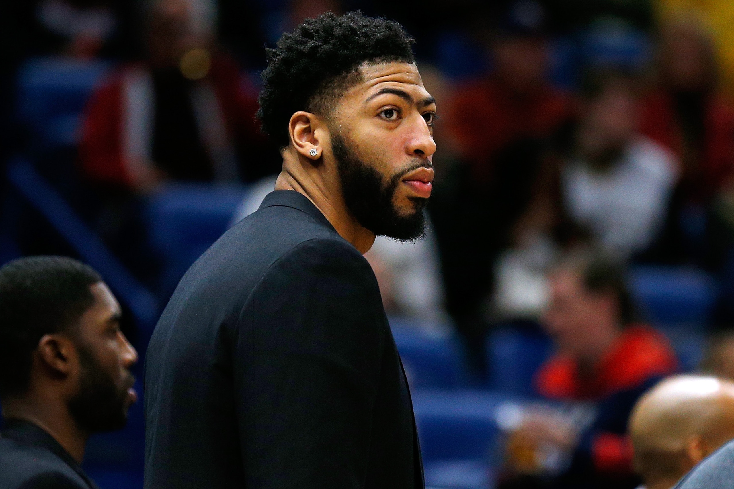 NEW ORLEANS, LOUISIANA - JANUARY 30: Injured Anthony Davis #23 of the New Orleans Pelicans reacts during the first half against the Denver Nuggets at the Smoothie King Center on January 30, 2019 in New Orleans, Louisiana. NOTE TO USER: User expressly acknowledges and agrees that, by downloading and or using this photograph, User is consenting to the terms and conditions of the Getty Images License Agreement. (Photo by Jonathan Bachman/Getty Images) NEW ORLEANS, LOUISIANA - JANUARY 30: Injured Anthony Davis #23 of the New Orleans Pelicans reacts during the first half against the Denver Nuggets at the Smoothie King Center on January 30, 2019 in New Orleans, Louisiana. NOTE TO USER: User expressly acknowledges and agrees that, by downloading and or using this photograph, User is consenting to the terms and conditions of the Getty Images License Agreement. (Photo by Jonathan Bachman/Getty Images)