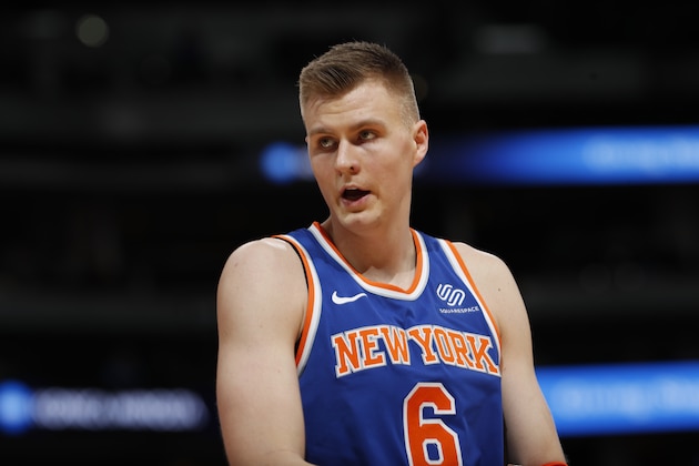 New York Knicks forward Kristaps Porzingis (6) in the second half of an NBA basketball game Thursday, Jan. 25, 2018, in Denver. The Nuggets won 130-118. (AP Photo/David Zalubowski)