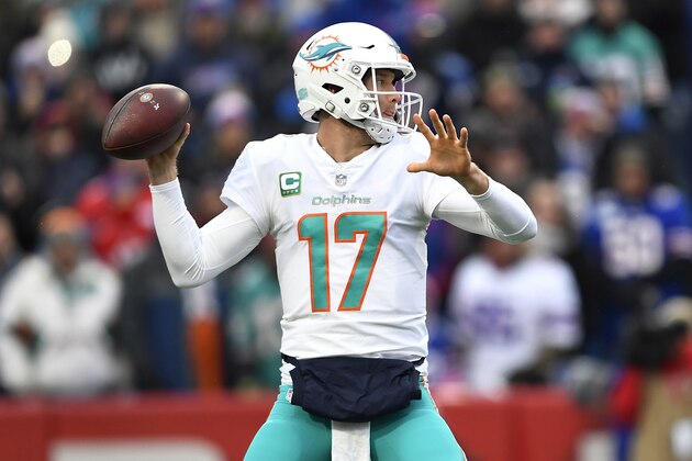Miami Dolphins quarterback Ryan Tannehill looks to throw during the first half of an NFL football game against the Buffalo Bills, Sunday, Dec. 30, 2018, in Orchard Park, N.Y. (AP Photo/Adrian Kraus)