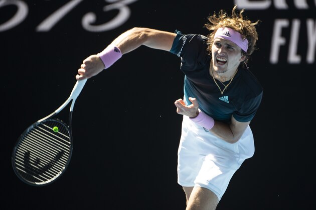 MELBOURNE, AUSTRALIA - JANUARY 21: Alexander Zverev of Germany serves to Milos Raonic of Canada during day eight of the 2019 Australian Open at Melbourne Park on January 21, 2019 in Melbourne, Australia. (Photo by TPN/Getty Images)