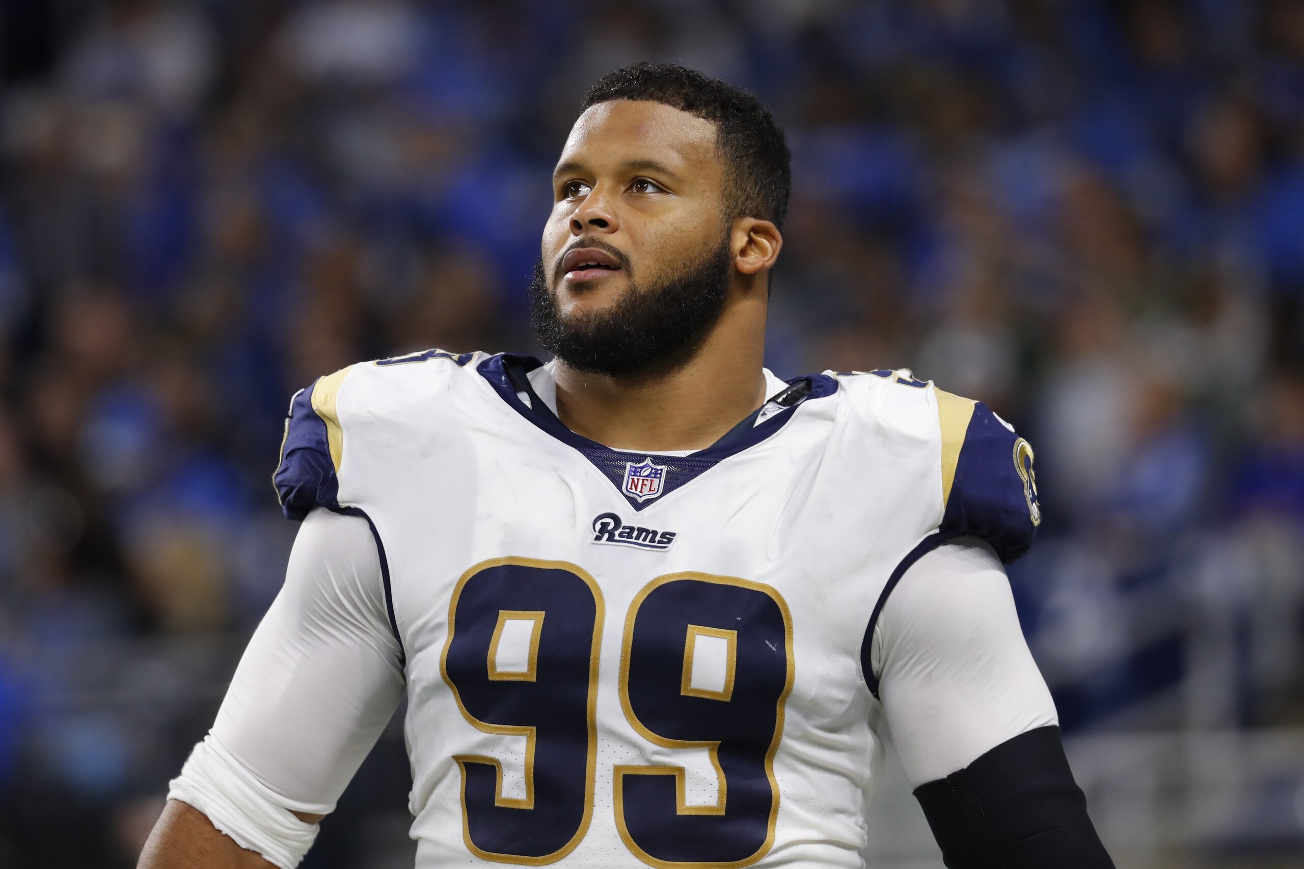 Los Angeles Rams defensive tackle Aaron Donald watches against the Detroit Lions during an NFL football game in Detroit, Sunday, Dec. 2, 2018. (AP Photo/Paul Sancya)