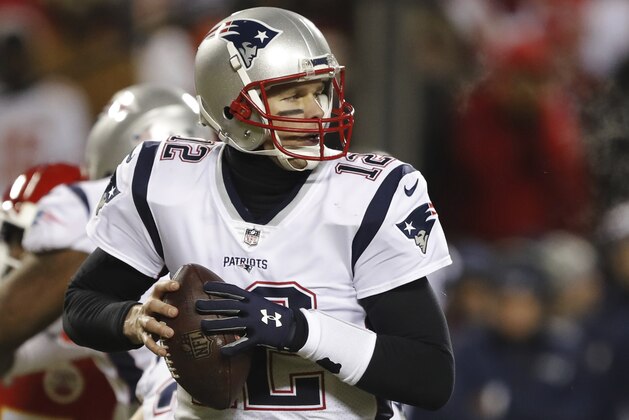 New England Patriots quarterback Tom Brady looks for a receiver during the first half of the AFC Championship NFL football game against the Kansas City Chiefs, Sunday, Jan. 20, 2019, in Kansas City, Mo. (AP Photo/Charlie Neibergall)