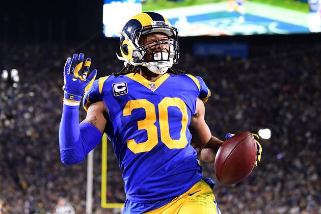 LOS ANGELES, CA - JANUARY 12:  Todd Gurley #30 of the Los Angeles Rams scores a 35 yard touchdown in the second quarter against the Dallas Cowboys in the NFC Divisional Playoff game at Los Angeles Memorial Coliseum on January 12, 2019 in Los Angeles, California.  (Photo by Harry How/Getty Images)