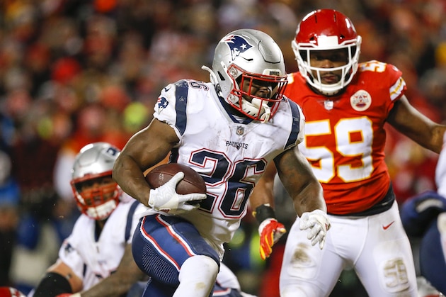 KANSAS CITY, MO - JANUARY 20: On a fourth down and one yard to go, running back Sony Michel #26 of the New England Patriots scores a touchdown past inside linebacker Reggie Ragland #59 of the Kansas City Chiefs in the AFC Championship Game at Arrowhead Stadium on January 20, 2019 in Kansas City, Missouri. (Photo by David Eulitt/Getty Images)