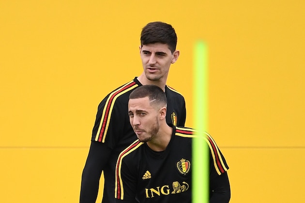 Belgium's goalkeeper Thibaut Courtois (back) and Belgium's forward Eden Hazard attend a training session at the Guchkovo Stadium in Dedovsk, outside Moscow, on July 9, 2018, on the eve of their Russia 2018 World Cup semi-final football match against France. (Photo by FRANCK FIFE / AFP)        (Photo credit should read FRANCK FIFE/AFP/Getty Images)