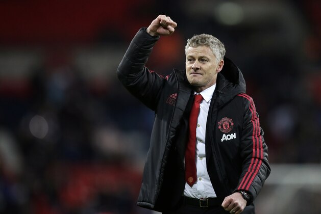 Manchester United caretaker manager Ole Gunnar Solskjaer celebrates at the end of the English Premier League soccer match between Tottenham Hotspur and Manchester United at Wembley stadium in London, England, Sunday, Jan. 13, 2019. Manchester United won 1-0. (AP Photo/Tim Ireland)