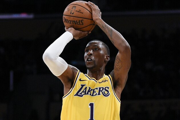 Los Angeles Lakers guard Kentavious Caldwell-Pope attempts a shot during the first half of an NBA preseason basketball game against the Sacramento Kings in Los Angeles, Thursday, Oct. 4, 2018. (AP Photo/Kelvin Kuo)