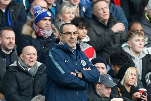 Chelsea's Italian head coach Maurizio Sarri watches from the touchline during the English Premier League football match between Chelsea and Huddersfield Town at Stamford Bridge in London on February 2, 2019. (Photo by Ian KINGTON / AFP) / RESTRICTED TO EDITORIAL USE. No use with unauthorized audio, video, data, fixture lists, club/league logos or 'live' services. Online in-match use limited to 120 images. An additional 40 images may be used in extra time. No video emulation. Social media in-match use limited to 120 images. An additional 40 images may be used in extra time. No use in betting publications, games or single club/league/player publications. /         (Photo credit should read IAN KINGTON/AFP/Getty Images)
