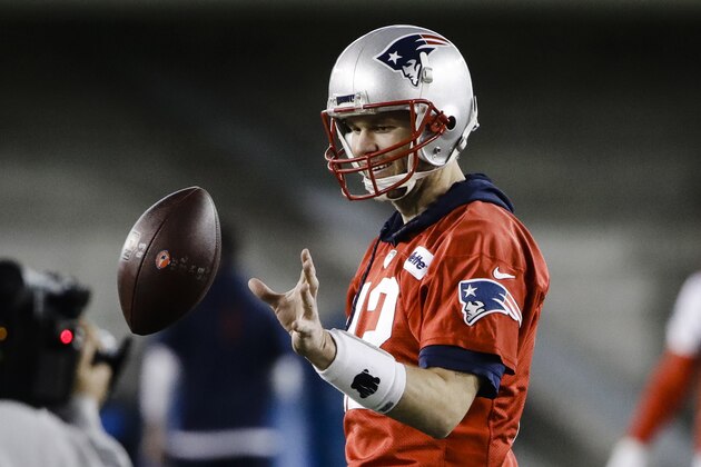 New England Patriots quarterback Tom Brady catches a ball during NFL football practice, Wednesday, Jan. 30, 2019, in Atlanta, as the team prepares for Super Bowl 53 against the Los Angeles Rams. (AP Photo/Matt Rourke)