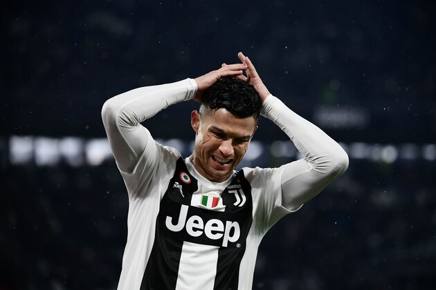 Juventus' Portuguese forward Cristiano Ronaldo reacts after missing a goal during the Italian Serie A football match Juventus vs Parma on February 2, 2019 at the Juventus stadium in Turin. (Photo by Marco BERTORELLO / AFP)        (Photo credit should read MARCO BERTORELLO/AFP/Getty Images)