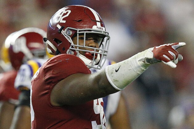 FILE - In this Nov. 4, 2017 file photo, Alabama defensive lineman Quinnen Williams celebrates after sacking LSU quarterback Myles Brennan during the second half of an NCAA college football game, in Tuscaloosa, Ala. Williams has been hot all season, really, but he was a monster in Alabama’s biggest game of the season so far against LSU. He had 10 tackles, seven solo stops, and 2½ sacks against the Tigers. (AP Photo/Brynn Anderson, File)