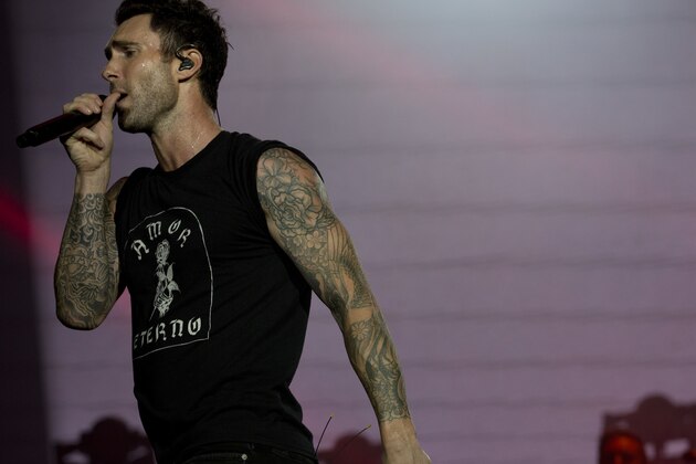 Adam Levine of Maroon 5 performs at the Rock in Rio music festival in Rio de Janeiro, Brazil, Saturday, Sept. 16, 2017. (AP Photo/Silvia Izquierdo)