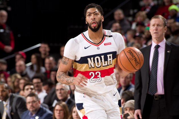 PORTLAND, OR - JANUARY 18: Anthony Davis #23 of the New Orleans Pelicans handles the ball against the Portland Trail Blazers  on January 18, 2019 at the Moda Center Arena in Portland, Oregon. NOTE TO USER: User expressly acknowledges and agrees that, by downloading and or using this photograph, user is consenting to the terms and conditions of the Getty Images License Agreement. Mandatory Copyright Notice: Copyright 2019 NBAE (Photo by Cameron Browne/NBAE via Getty Images)