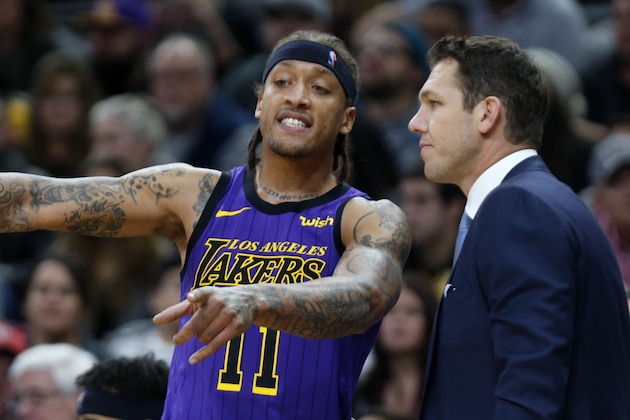 SAN ANTONIO, TX - DECEMBER 7: Michael Beasley #11 of the Los Angeles Lakers talks with head coach Luke Walton during game against the San Antonio Spurs at AT&T Center on December 7 , 2018 in San Antonio, Texas.  NOTE TO USER: User expressly acknowledges and agrees that , by downloading and or using this photograph, User is consenting to the terms and conditions of the Getty Images License Agreement. (Photo by Ronald Cortes/Getty Images)