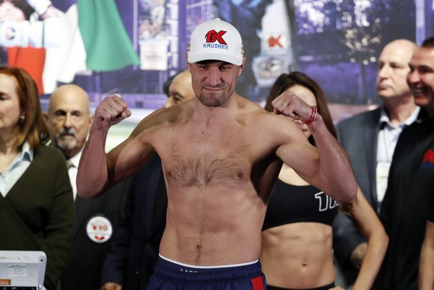 Sergey Kovalev of Russia poses after his weigh-in in Frisco, Texas, Friday, Feb. 1, 2019. Kovalev is scheduled to fight Eleider Alvarez, the WBO light heavyweight champion for the title on Saturday night.(AP Photo/Tony Gutierrez)