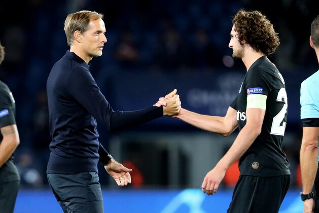 PARIS, FRANCE - OCTOBER 03:  Adrien Rabiot of Paris Saint-Germain celebrates with head coach Thomas Tuchel after the Group C match of the UEFA Champions League between Paris Saint-Germain and Red Star Belgrade at Parc des Princes on October 3, 2018 in Paris, France.  (Photo by Xavier Laine/Getty Images)