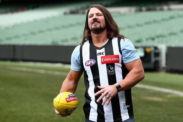 MELBOURNE, AUSTRALIA - JUNE 24: Smackdown women's champion Carmella and WWE'S world champion AJ Styles show their football skills at the Melbourne Cricket Ground on June 24, 2018 in Melbourne, Australia. (Photo by Robert Prezioso/Getty Images)