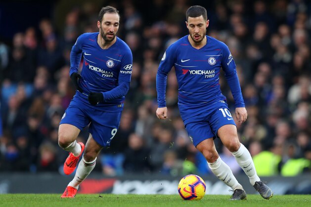 LONDON, ENGLAND - FEBRUARY 02: Gonzalo Higuain of Chelsea and Eden Hazard of Chelsea  during the Premier League match between Chelsea FC and Huddersfield Town at Stamford Bridge on February 02, 2019 in London, United Kingdom. (Photo by Catherine Ivill/Getty Images)