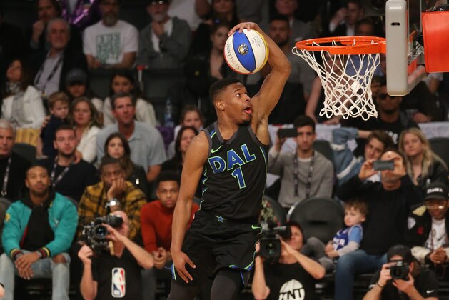 LOS ANGELES, CA - FEBRUARY 17: Dennis Smith Jr. #1 of the Dallas Mavericks dunks the ball during the Verizon Slam Dunk Contest during State Farm All-Star Saturday Night as part of the 2018 NBA All-Star Weekend on February 17, 2018 at STAPLES Center in Los Angeles, California. NOTE TO USER: User expressly acknowledges and agrees that, by downloading and/or using this photograph, user is consenting to the terms and conditions of the Getty Images License Agreement. Mandatory Copyright Notice: Copyright 2018 NBAE (Photo by Gary Dineen/NBAE via Getty Images) LOS ANGELES, CA - FEBRUARY 17: Dennis Smith Jr. #1 of the Dallas Mavericks dunks the ball during the Verizon Slam Dunk Contest during State Farm All-Star Saturday Night as part of the 2018 NBA All-Star Weekend on February 17, 2018 at STAPLES Center in Los Angeles, California. NOTE TO USER: User expressly acknowledges and agrees that, by downloading and/or using this photograph, user is consenting to the terms and conditions of the Getty Images License Agreement. Mandatory Copyright Notice: Copyright 2018 NBAE (Photo by Gary Dineen/NBAE via Getty Images)