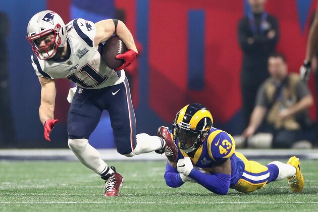 ATLANTA, GA - FEBRUARY 03: Julian Edelman #11 of the New England Patriots avoids a tackle by John Johnson III #43 of the Los Angeles in the second half during Super Bowl LIII at Mercedes-Benz Stadium on February 3, 2019 in Atlanta, Georgia.  (Photo by Jamie Squire/Getty Images)