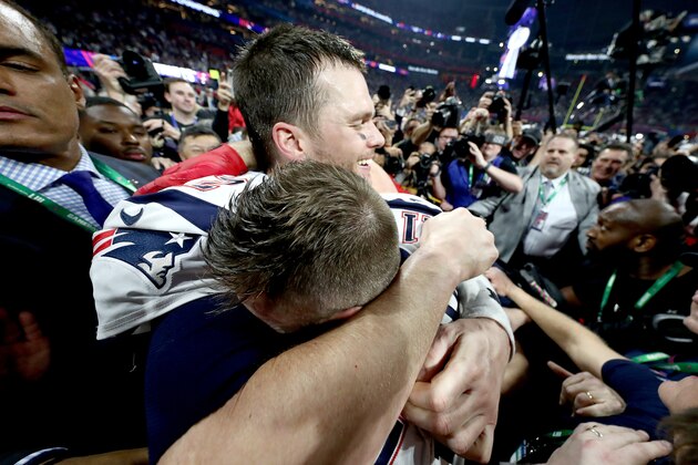 ATLANTA, GEORGIA - FEBRUARY 03:  Tom Brady #12 of the New England Patriots and Julian Edelman #11 celebrate their teams 13-3 win over the Los Angeles Rams during Super Bowl LIII at Mercedes-Benz Stadium on February 03, 2019 in Atlanta, Georgia. (Photo by Al Bello/Getty Images)