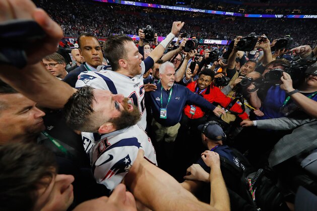 ATLANTA, GA - FEBRUARY 03:  Tom Brady #12 celebrates with Julian Edelman #11 of the New England Patriots after the Patriots defeat the Los Angeles Rams 13-3 during Super Bowl LIII at Mercedes-Benz Stadium on February 3, 2019 in Atlanta, Georgia.  (Photo by Kevin C. Cox/Getty Images)