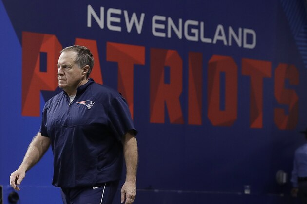 New England Patriots head coach Bill Belichick walks onto the field before the NFL Super Bowl 53 football game between the Los Angeles Rams and the New England Patriots Sunday, Feb. 3, 2019, in Atlanta. (AP Photo/Matt Rourke)