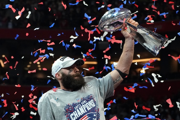 Wide receiver for the New England Patriots Julian Edelman holds the trophy as he celebrates Super Bowl LIII against the Los Angeles Rams at Mercedes-Benz Stadium in Atlanta, Georgia, on February 3, 2019. (Photo by TIMOTHY A. CLARY / AFP)        (Photo credit should read TIMOTHY A. CLARY/AFP/Getty Images)
