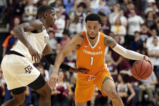 Tennessee guard Lamonte Turner (1) drives around Texas A&M guard Jay Jay Chandler, left, during the second half of an NCAA college basketball game Saturday, Feb. 2, 2019, in College Station, Texas. (AP Photo/Michael Wyke)