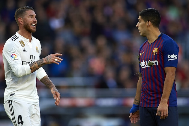 BARCELONA, SPAIN - OCTOBER 28:  Sergio Ramos of Real Madrid reacts to Luis Suarez of Barcelona during the La Liga match between FC Barcelona and Real Madrid CF at Camp Nou on October 28, 2018 in Barcelona, Spain.  (Photo by Quality Sport Images/Getty Images )