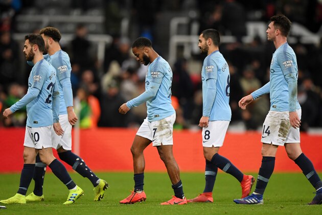 NEWCASTLE UPON TYNE, ENGLAND - JANUARY 29: The Manchester City team walk off dejcted after the Premier League match between Newcastle United and Manchester City at St. James Park on January 29, 2019 in Newcastle upon Tyne, United Kingdom.  (Photo by Stu Forster/Getty Images)