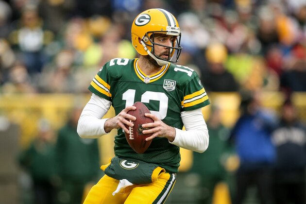 GREEN BAY, WISCONSIN - DECEMBER 30:  Aaron Rodgers #12 of the Green Bay Packers drops back to pass in the first quarter against the Detroit Lions at Lambeau Field on December 30, 2018 in Green Bay, Wisconsin. (Photo by Dylan Buell/Getty Images)