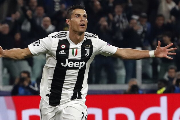 Juventus forward Cristiano Ronaldo celebrates after scoring his side's opening goal during the Champions League group H soccer match between Juventus and Manchester United at the Allianz stadium in Turin, Italy, Wednesday, Nov. 7, 2018. (AP Photo/Antonio Calanni)