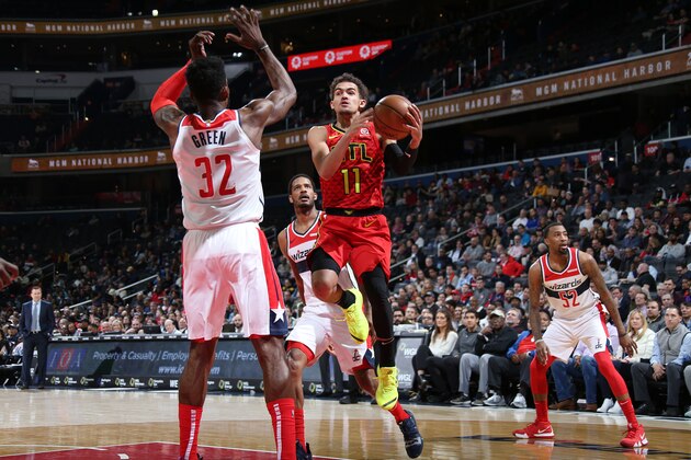 WASHINGTON, DC - FEBRUARY 4: Trae Young #11 of the Atlanta Hawks goes to the basket against the Washington Wizards on February 4, 2019 at Capital One Arena in Washington, DC. NOTE TO USER: User expressly acknowledges and agrees that, by downloading and/or using this photograph, user is consenting to the terms and conditions of the Getty Images License Agreement. Mandatory Copyright Notice: Copyright 2019 NBAE (Photo by Stephen Gosling/NBAE via Getty Images)
