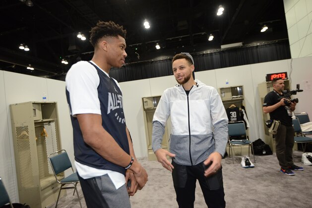 LOS ANGELES, CA - FEBRUARY 17: Giannis Antetokounmpo #34 of team Stephen and Stephen Curry #30 of team Stephen talk before the 2018 NBA All Star Practice as part of 2018 All-Star Weekend at Verizon Up Arena at LACC on February 17, 2018 in Los Angeles, California. NOTE TO USER: User expressly acknowledges and agrees that, by downloading and/or using this photograph, user is consenting to the terms and conditions of the Getty Images License Agreement. Mandatory Copyright Notice: Copyright 2018 NBAE (Photo by Noah Graham/NBAE via Getty Images)
