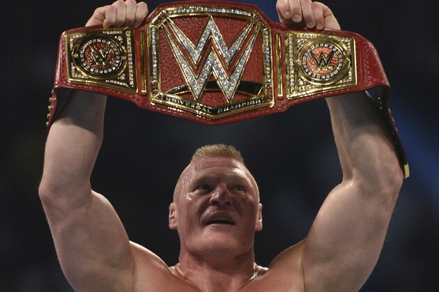 Brock Lesnar celebrates after winning the WWE Universal Championship match as part of as part of the World Wrestling Entertainment (WWE) Crown Jewel pay-per-view at the King Saud University Stadium in Riyadh on November 2, 2018. (Photo by Fayez Nureldine / AFP)        (Photo credit should read FAYEZ NURELDINE/AFP/Getty Images)