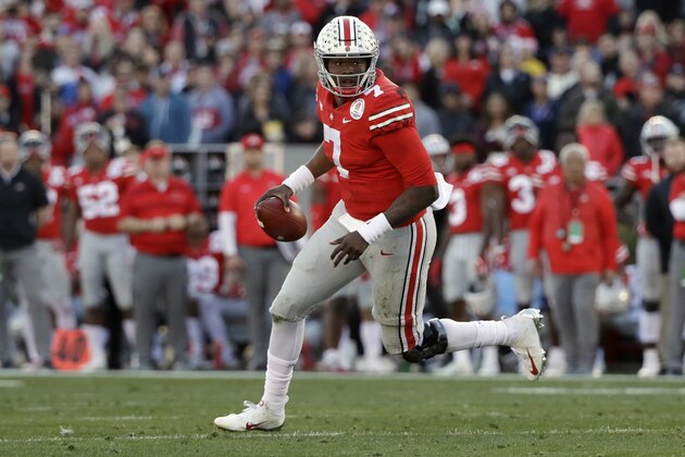 FILE - In this Jan. 1, 2019, file photo, Ohio State quarterback Dwayne Haskins runs against Washington during the first half of the Rose Bowl NCAA college football game, in Pasadena, Calif. Record-setting Ohio State quarterback Dwayne Haskins Jr. says he is leaving school to enter the NFL draft. The third-year sophomore announced Monday, Jan. 7, 2019,  on Twitter that he will depart the program after one year as a starter in which he broke most school and Big Ten single-season passing records. (AP Photo/Jae C. Hong, File)