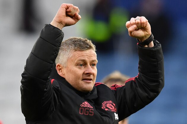 Manchester United's Norwegian caretaker manager Ole Gunnar Solskjaer celebrates on the pitch after the English Premier League football match between Leicester City and Manchester United at King Power Stadium in Leicester, central England on February 3, 2019. (Photo by Ben STANSALL / AFP) / RESTRICTED TO EDITORIAL USE. No use with unauthorized audio, video, data, fixture lists, club/league logos or 'live' services. Online in-match use limited to 120 images. An additional 40 images may be used in extra time. No video emulation. Social media in-match use limited to 120 images. An additional 40 images may be used in extra time. No use in betting publications, games or single club/league/player publications. /         (Photo credit should read BEN STANSALL/AFP/Getty Images)