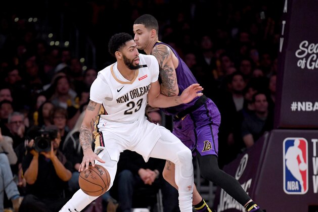 LOS ANGELES, CALIFORNIA - DECEMBER 21:  Anthony Davis #23 of the New Orleans Pelicans drives on Kyle Kuzma #0 of the Los Angeles Lakers during a 112-104 Laker win at Staples Center on December 21, 2018 in Los Angeles, California.  NOTE TO USER: User expressly acknowledges and agrees that, by downloading and or using this photograph, User is consenting to the terms and conditions of the Getty Images License Agreement. (Photo by Harry How/Getty Images)
