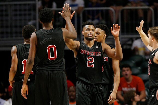 MIAMI, FL - JANUARY 03:  Torin Dorn #2 of the North Carolina State Wolfpack celebrates with teammates after a basket against the Miami Hurricanes during the second half at Watsco Center on January 3, 2019 in Miami, Florida.  (Photo by Michael Reaves/Getty Images)