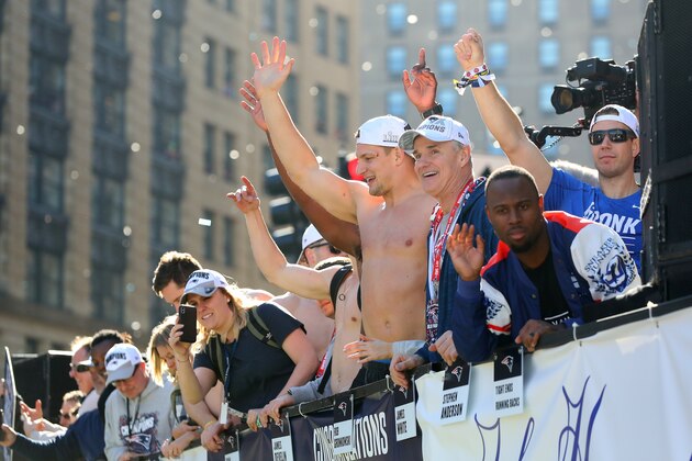 BOSTON, MASSACHUSETTS - FEBRUARY 05: Rob Gronkowski #87 of the New England Patriots and James White #28 celebrate on Cambridge street during the New England Patriots Victory Parade on February 05, 2019 in Boston, Massachusetts. (Photo by Maddie Meyer/Getty Images)