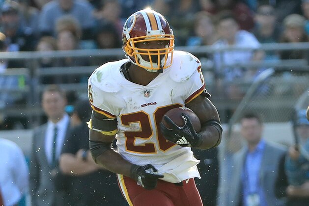 JACKSONVILLE, FLORIDA - DECEMBER 16: Adrian Peterson #26 of the Washington Redskins runs for yardage during the game against the Jacksonville Jaguars at TIAA Bank Field on December 16, 2018 in Jacksonville, Florida. (Photo by Sam Greenwood/Getty Images)